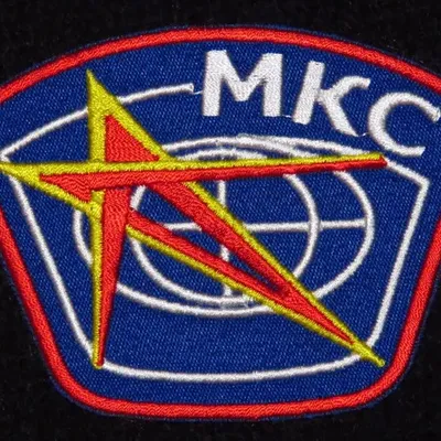 Ecusson MKC = ISS