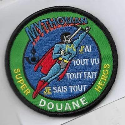 Douane - Super Héros Mythomane