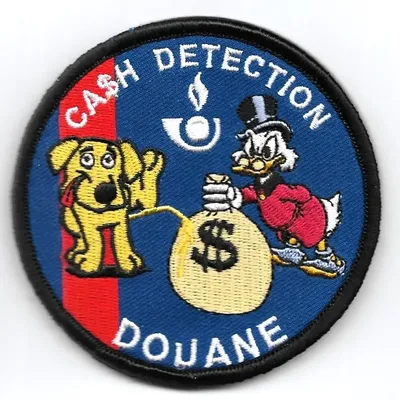 Douane - Cash Détection (humoristique) - chien beige et Picsou