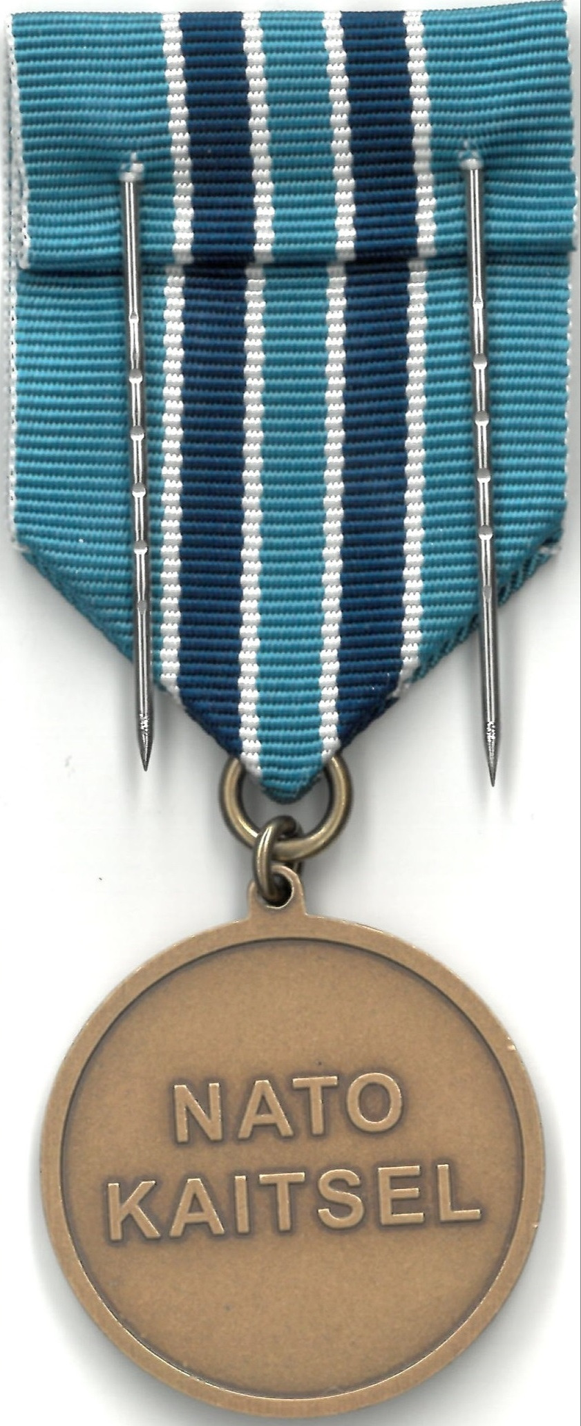 Verso de OTAN, médaille Estonienne, opération Lynx