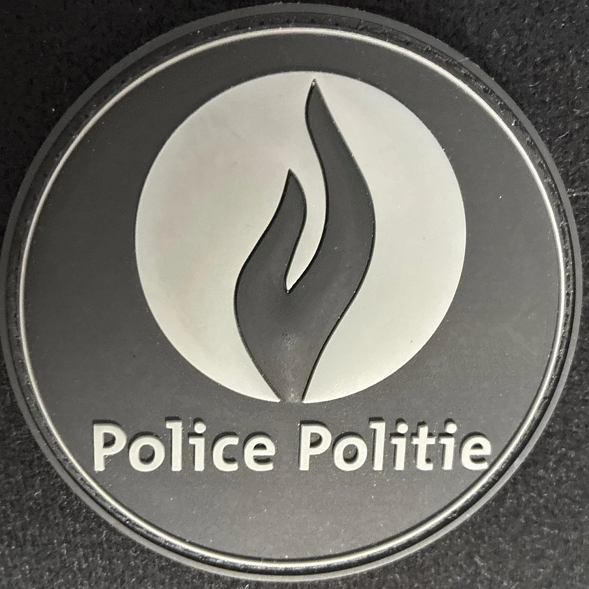 Insigne bilinguale de la police belge