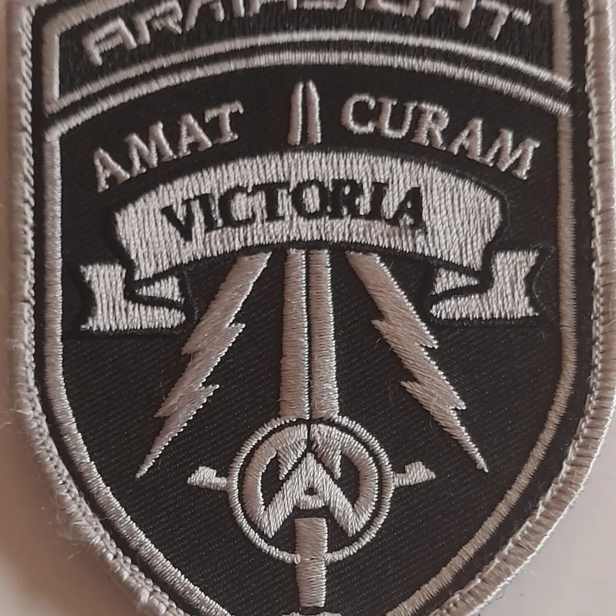 ARMASIGHT  Amat Curam Victoria